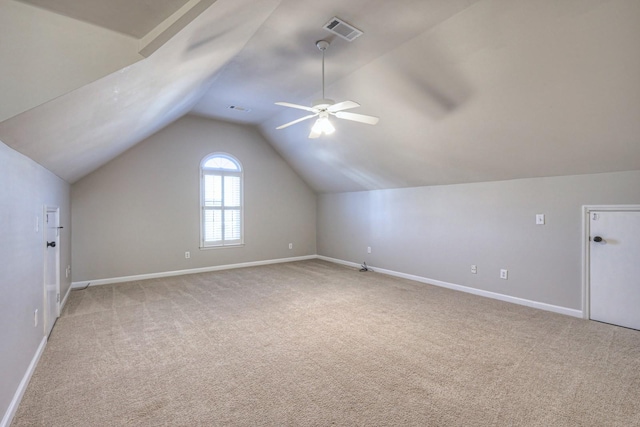 bonus room featuring carpet floors, vaulted ceiling, and ceiling fan