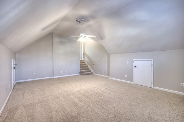 bonus room featuring carpet, vaulted ceiling, and ceiling fan