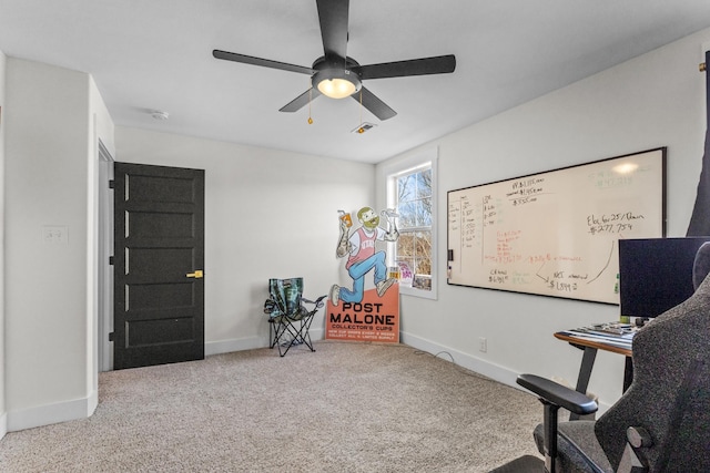 carpeted home office with ceiling fan