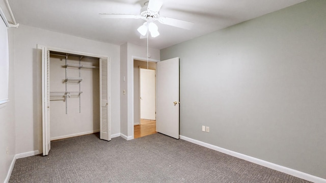 unfurnished bedroom with carpet flooring, a closet, and ceiling fan