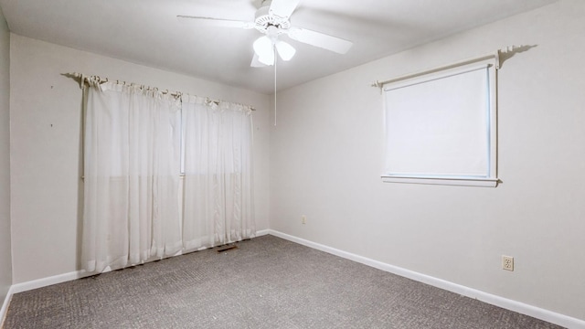 carpeted empty room with ceiling fan