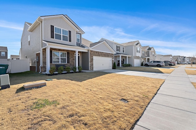 view of front facade with a front yard and a garage