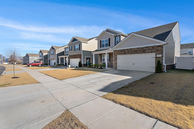 view of front of home featuring a garage and a front lawn