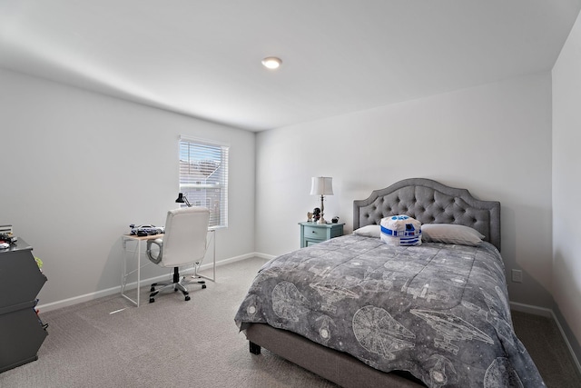 bedroom with light colored carpet