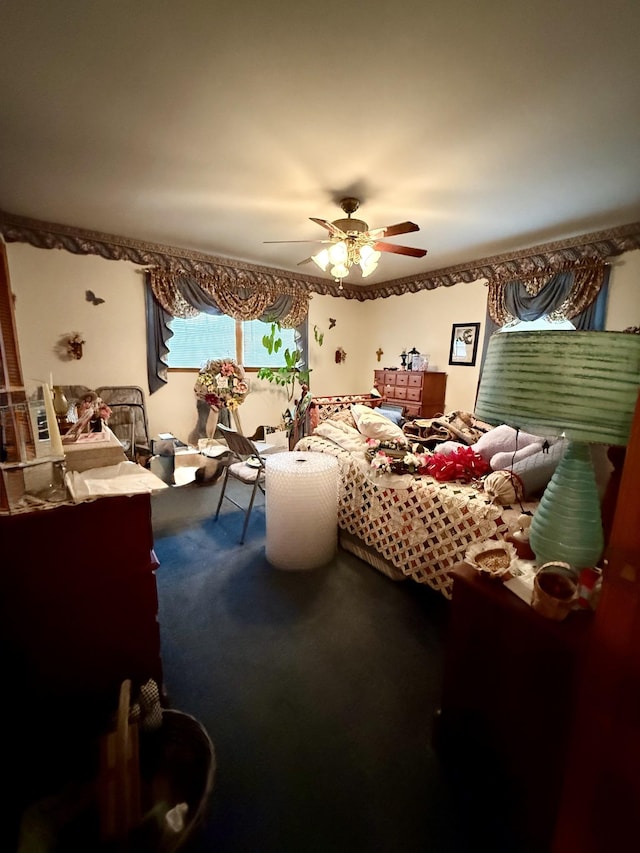 bedroom with ceiling fan and carpet floors