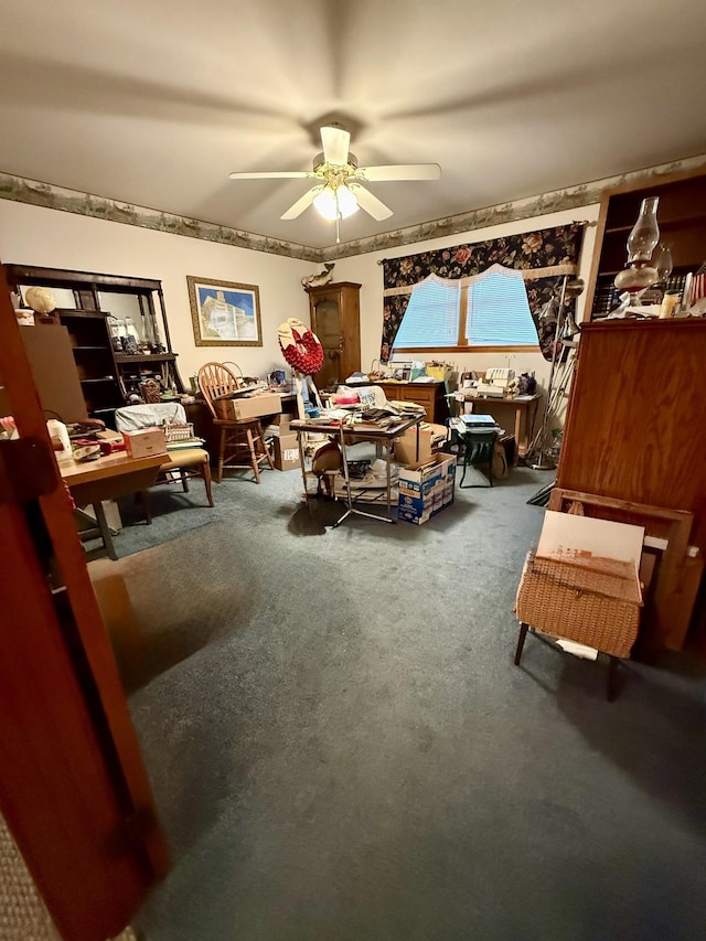 sitting room featuring carpet flooring and ceiling fan