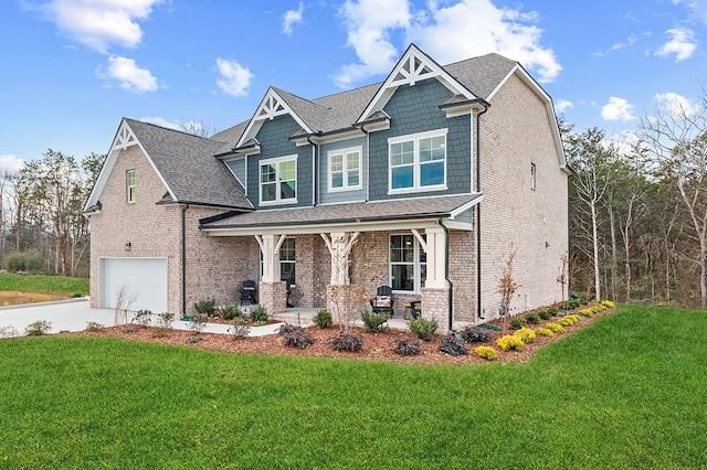 craftsman-style house with a front yard, a porch, and a garage