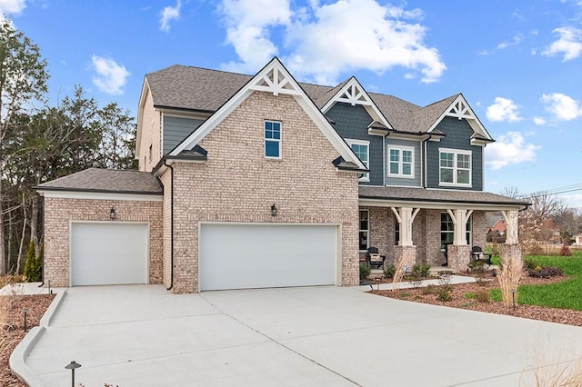 craftsman-style house with covered porch and a garage