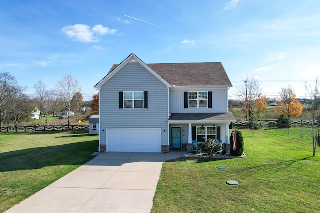 view of front property with a garage and a front lawn