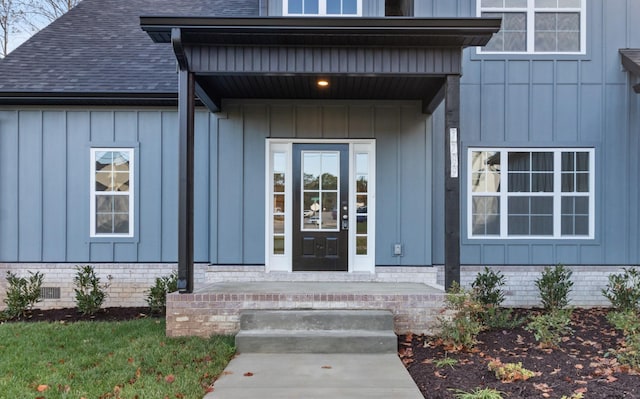 entrance to property with a porch