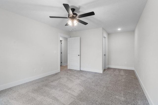 unfurnished bedroom featuring carpet flooring and ceiling fan