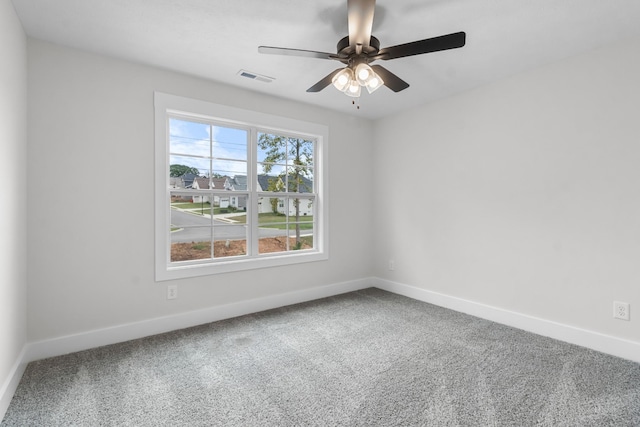 carpeted empty room with ceiling fan