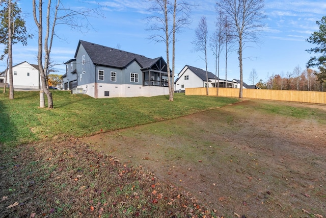 view of yard with a sunroom