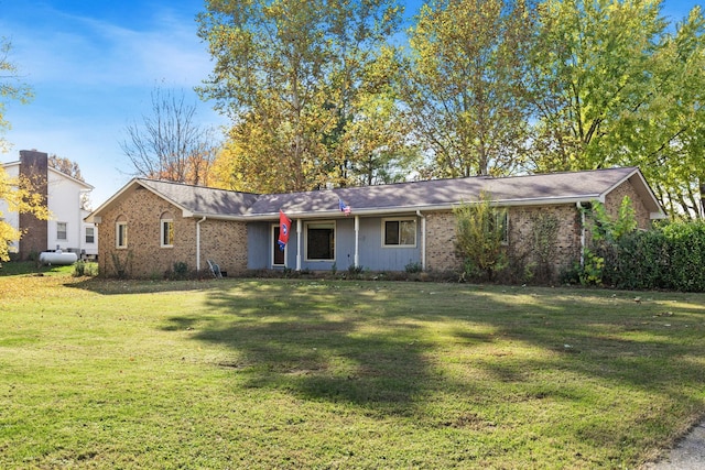 ranch-style house with a front lawn