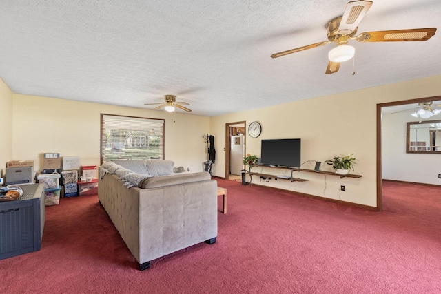 carpeted living room with a textured ceiling