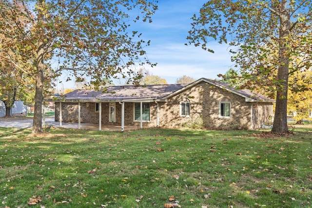 ranch-style house with a front lawn