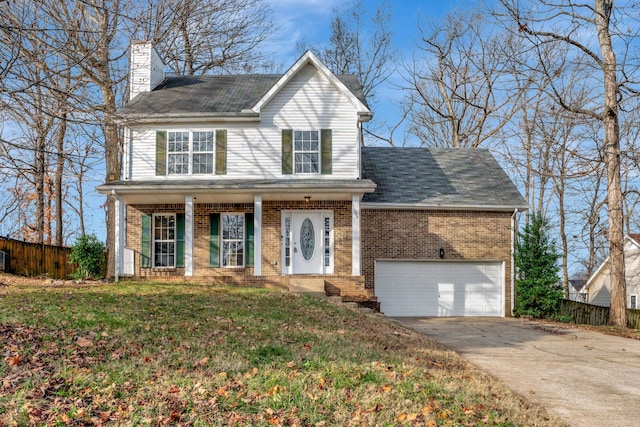 view of front of home featuring a garage and a front lawn