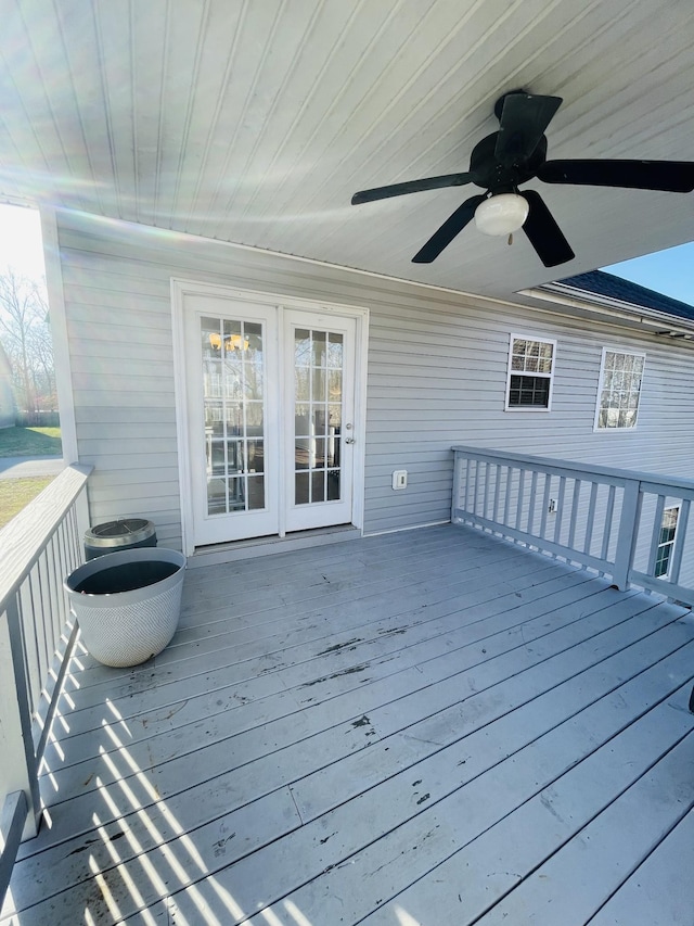 wooden deck with ceiling fan