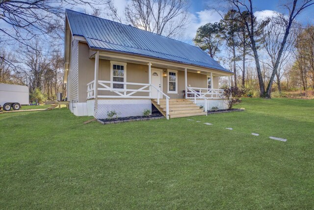 view of front of home featuring covered porch and a front yard