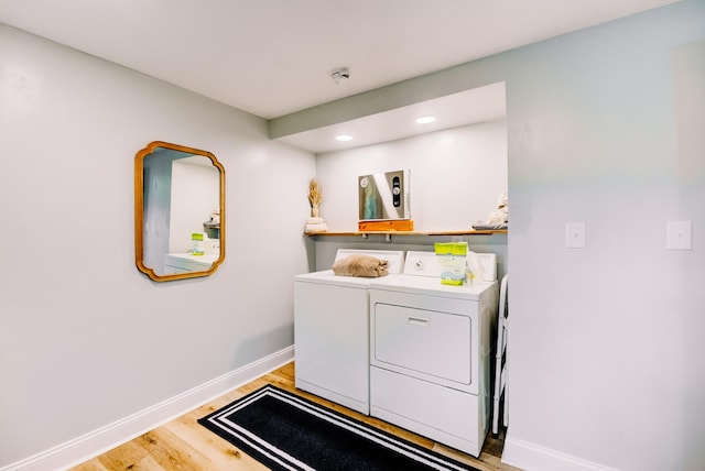 70 Laneview Concord Rd, Trenton, TN 38382 - laundry area with washing machine and clothes dryer, light wood-type flooring, and recessed lighting