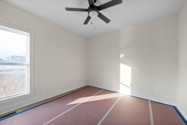 unfurnished room featuring ceiling fan