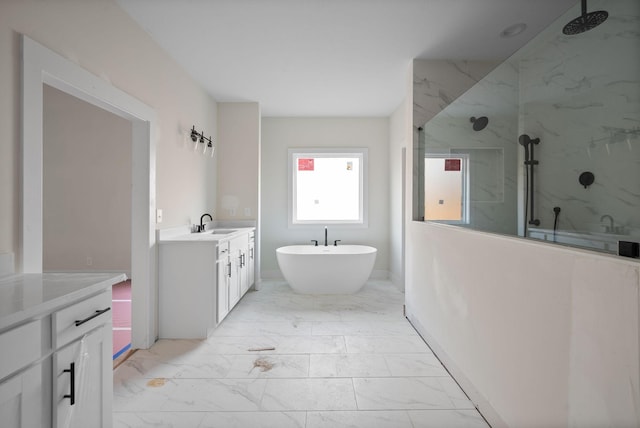 bathroom featuring vanity and shower with separate bathtub