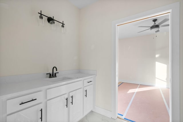 bathroom featuring vanity and ceiling fan