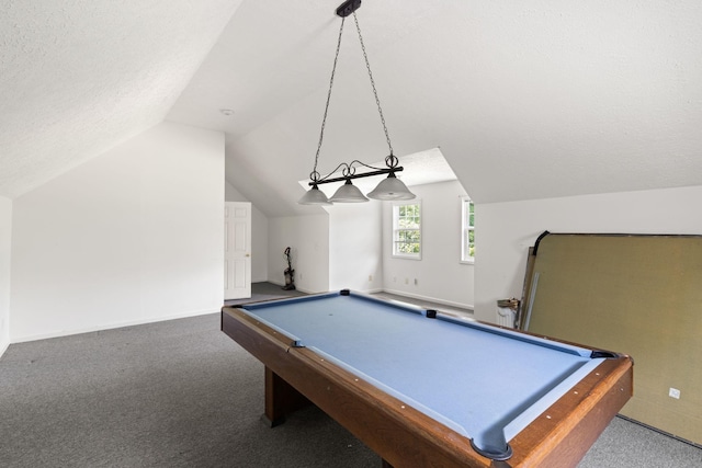 game room with carpet, a textured ceiling, lofted ceiling, and billiards