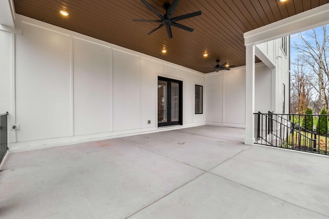 view of patio / terrace featuring ceiling fan and french doors