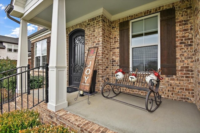 doorway to property with a porch