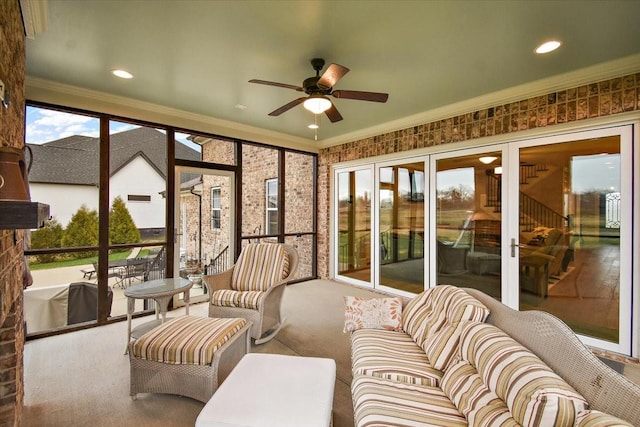 sunroom / solarium with ceiling fan