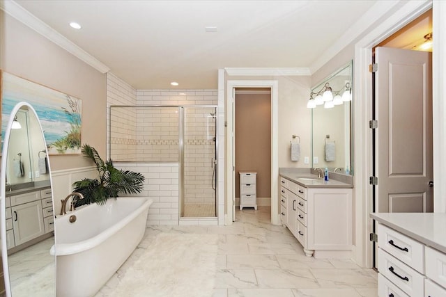 bathroom with vanity, ornamental molding, and plus walk in shower