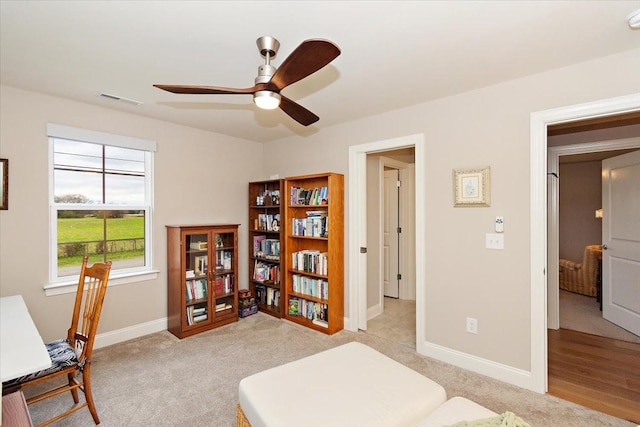 interior space featuring ceiling fan and light wood-type flooring