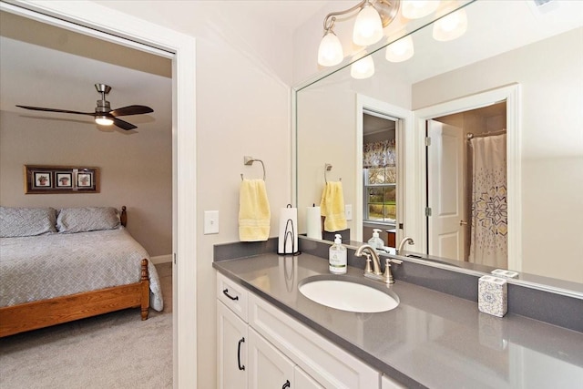 bathroom featuring ceiling fan and vanity