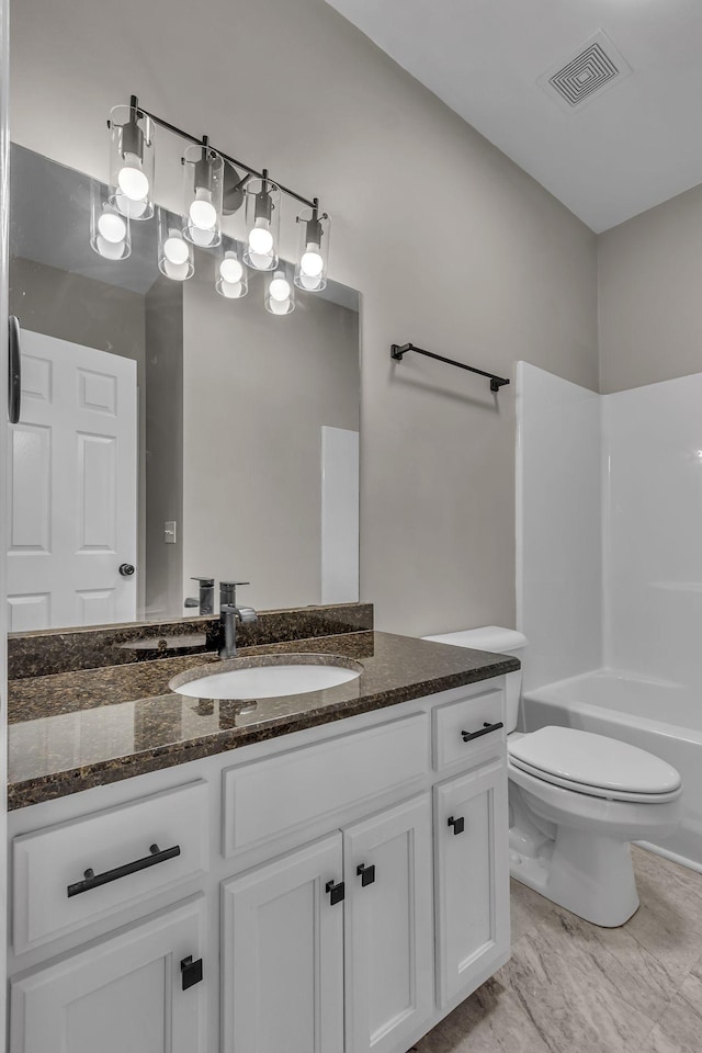 full bathroom featuring vanity, toilet, and shower / tub combination