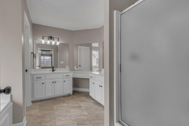 bathroom with vanity and walk in shower