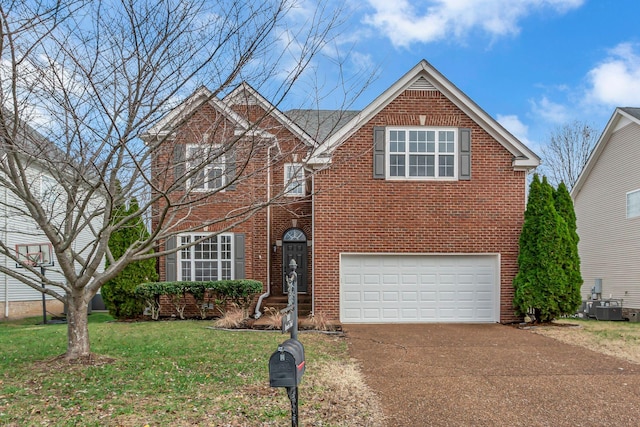 view of property with central AC unit, a garage, and a front lawn