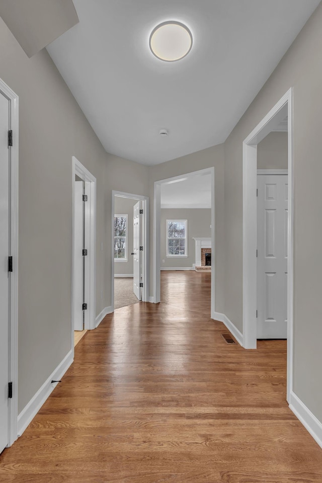 hall featuring light hardwood / wood-style flooring