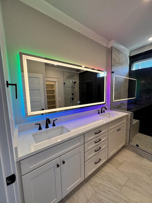 bathroom with vanity and an enclosed shower