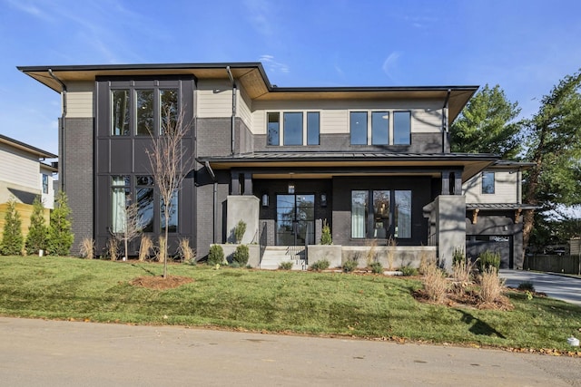 contemporary house featuring a front lawn