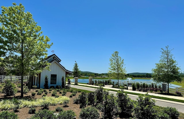 view of yard with a water view