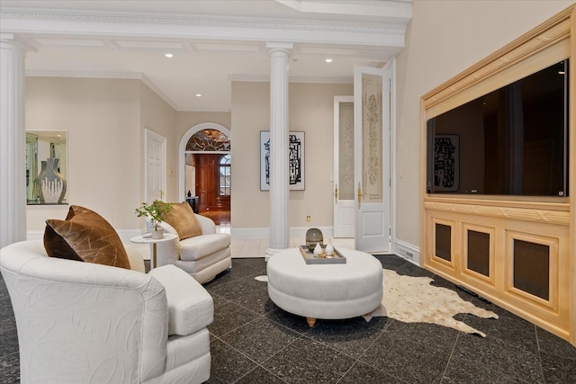 living room with granite finish floor, decorative columns, and recessed lighting