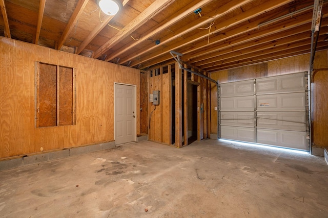 garage with wood walls