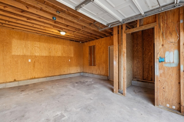 garage with wood walls