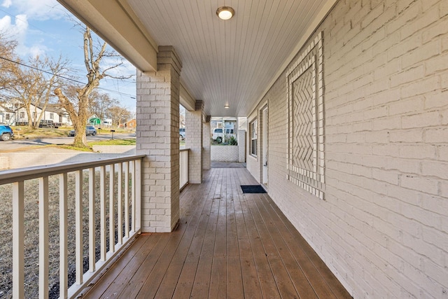 wooden deck with a porch