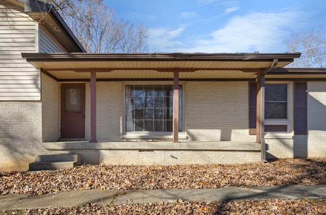 entrance to property with covered porch