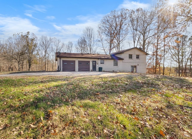 view of front of home featuring a garage