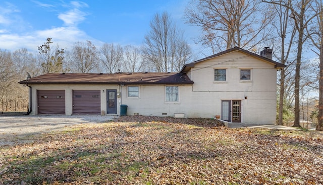 exterior space with a garage