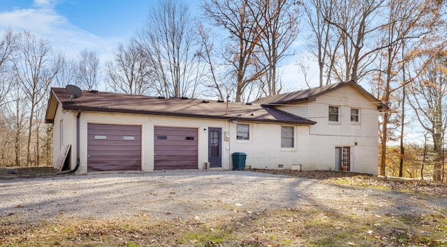 view of front of home with a garage