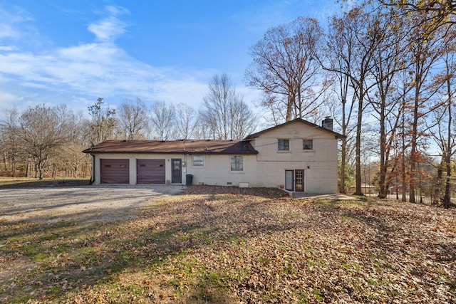 view of front of home featuring a garage